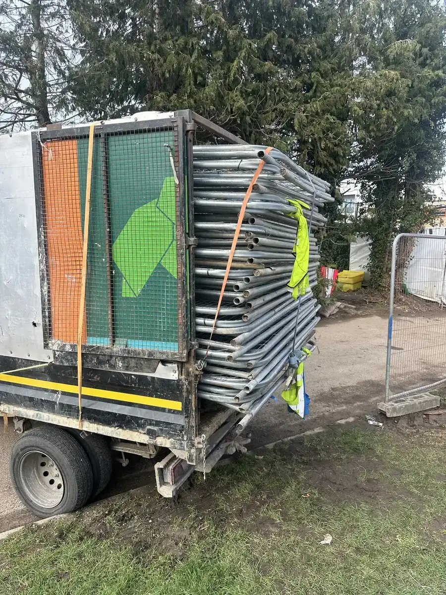 Collection vehicle loaded with site equipment