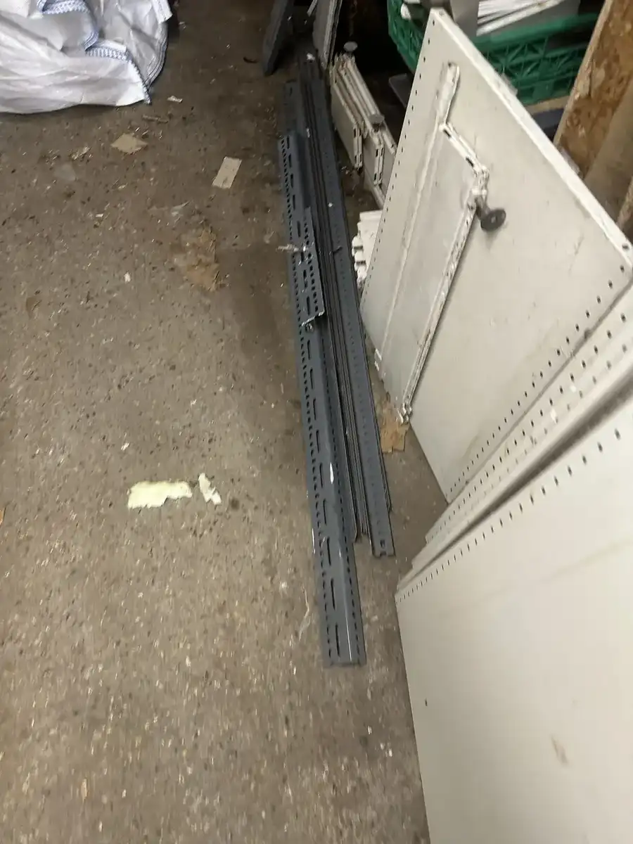 Long metal rails in commercial storage area