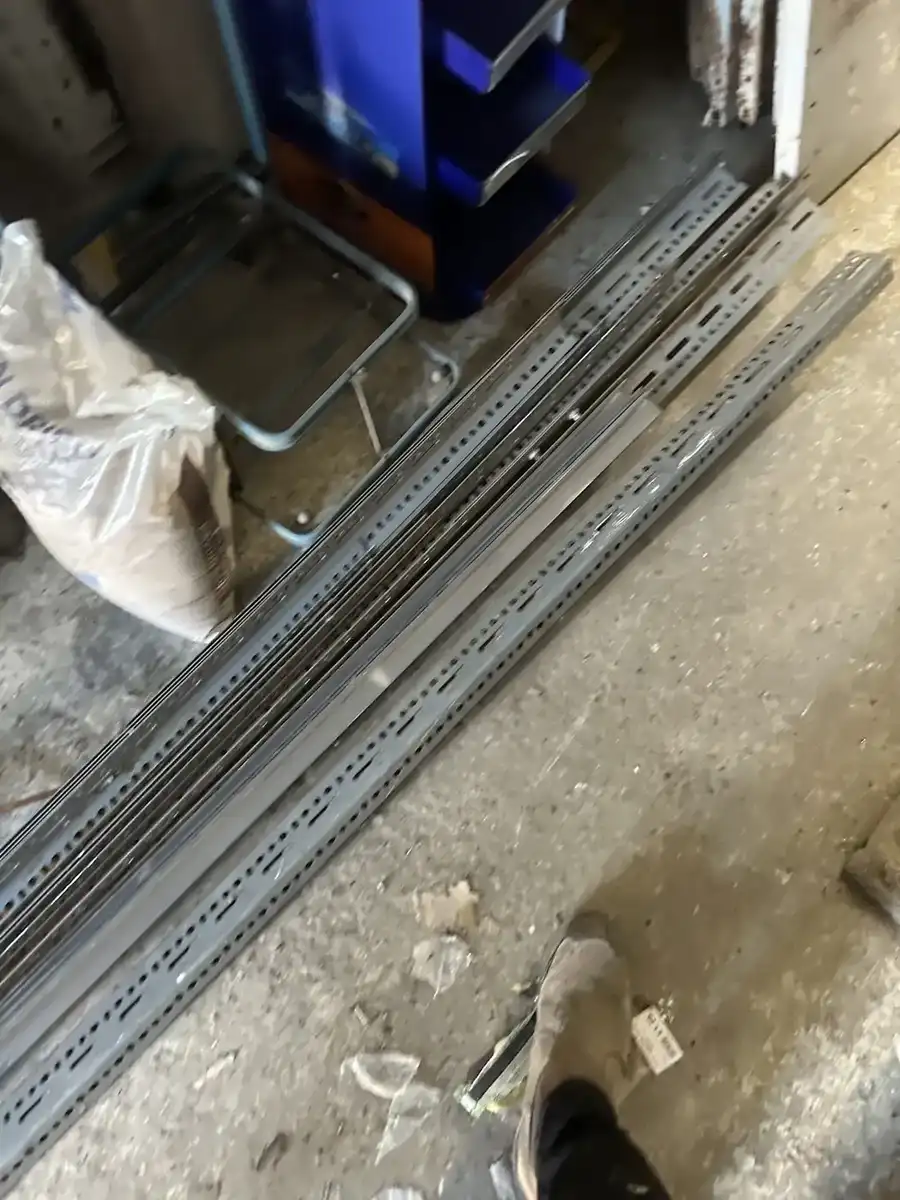 Mixed metal rails and equipment at floor level