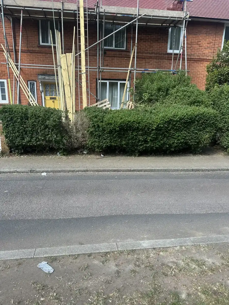 Roadside access outside scaffolded property